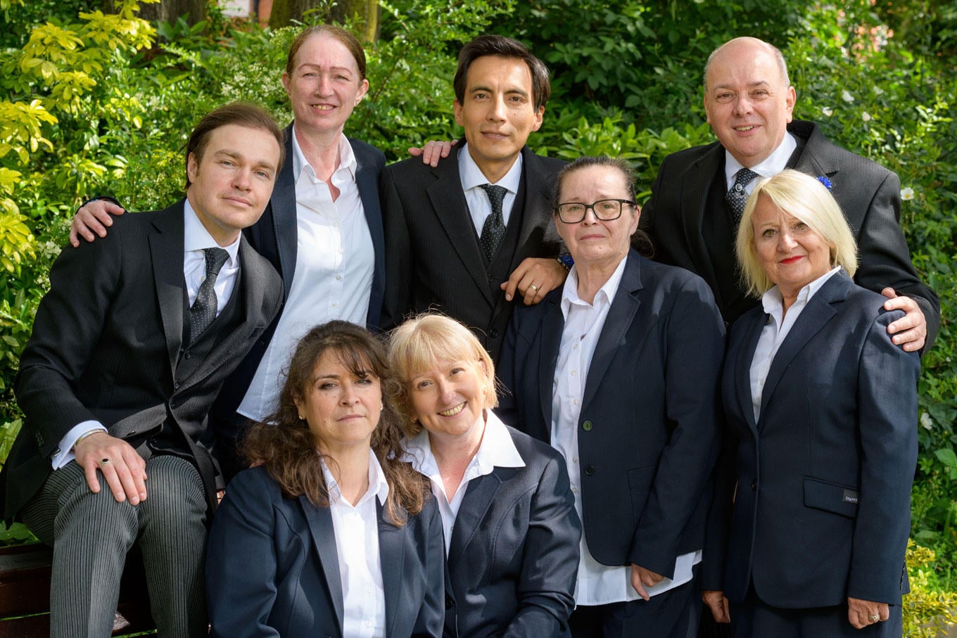 The team from JH Kenyon Funeral Directors in north London gather together at a local park